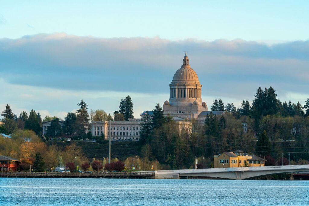 Scenic view of the Washington State Capitol in Olympia with surrounding nature.